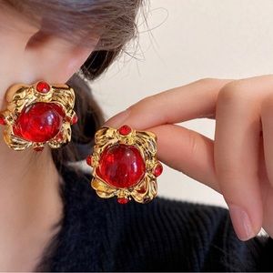 Red stud gold trim stud luxury earrings